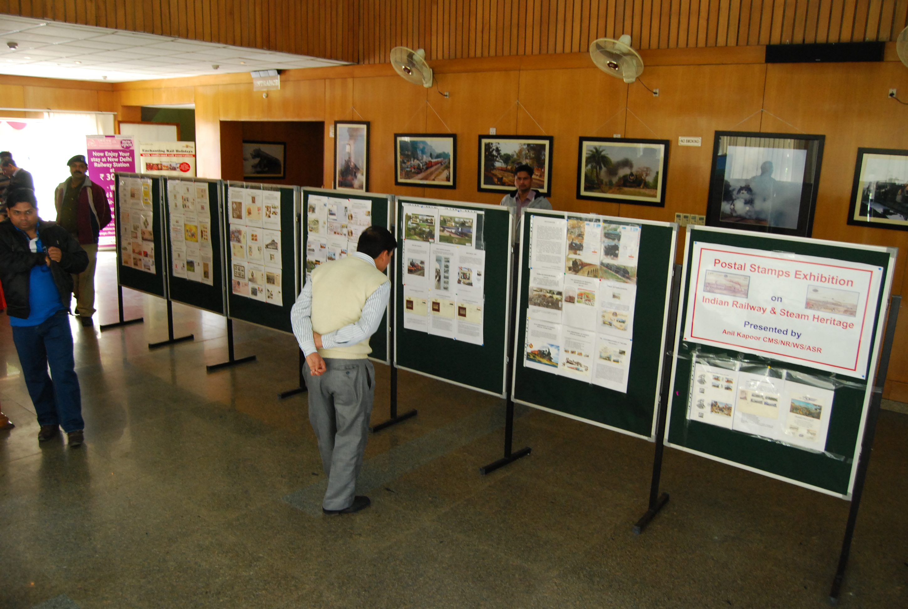 Corporate exhibition booth setup with custom branding and interactive displays