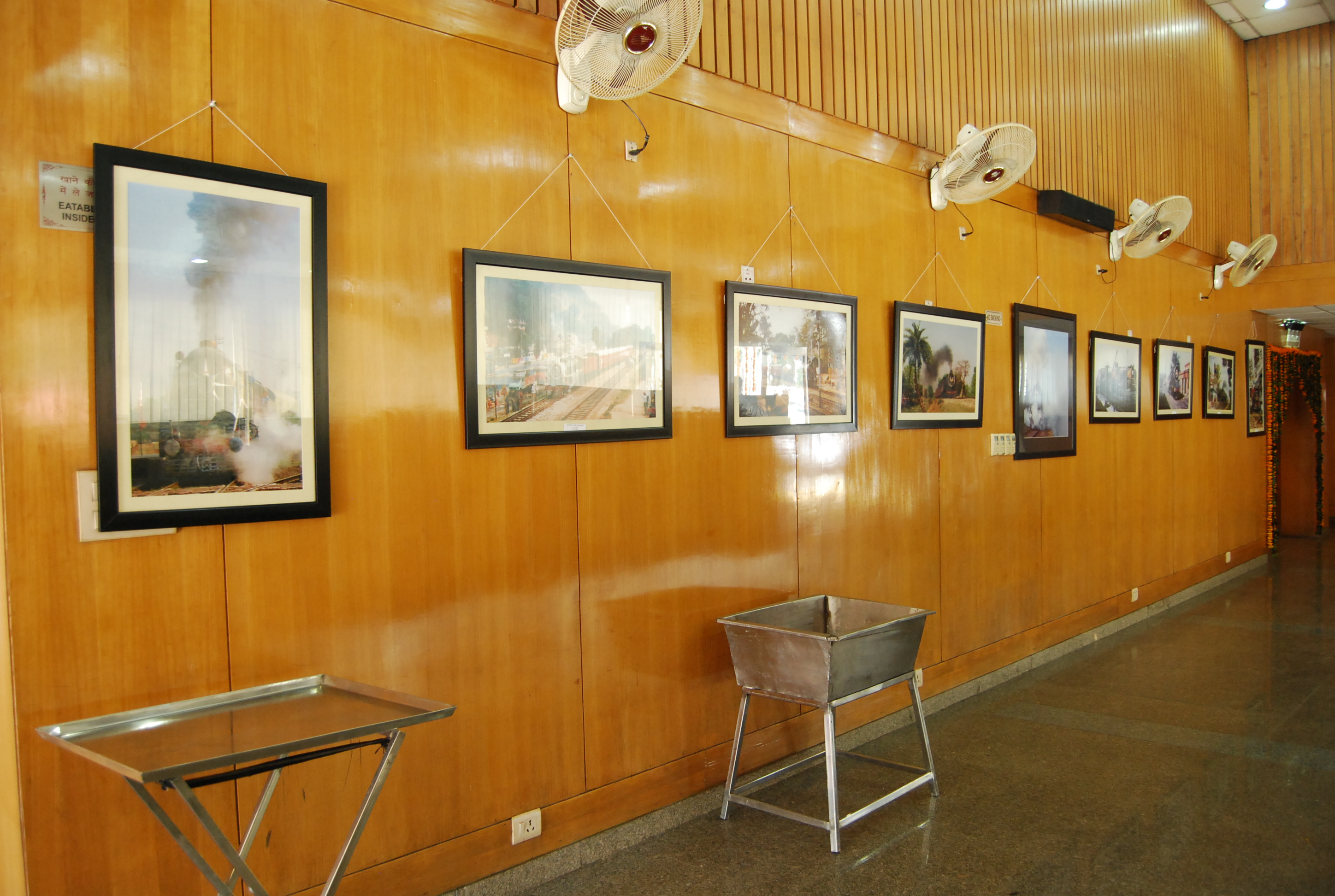 Trade show stall with product display zones and visitor engagement area